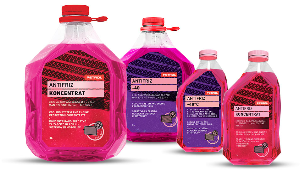Na sliki so plastenke Petrol antifriza v rdeči in vijolični barvi.