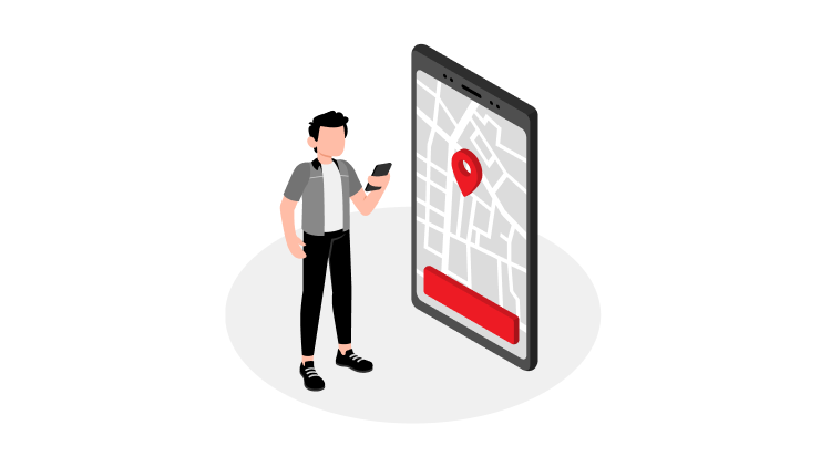 Na ilustraciji je oseba, ki v roki drži pametni telefon. Ob njej je prikazan velik zaslon z zemljevidom in rdečim označevalcem lokacije, ki nakazuje iskanje ali potrditev lokacije.
