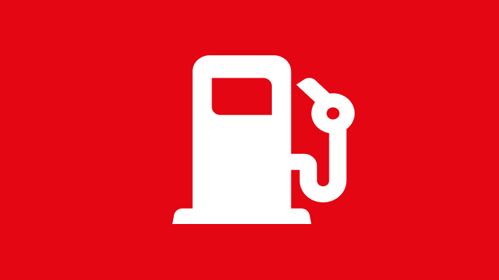 Na sliki je bela ikona bencinske črpalke. Ozadje je enotne rdeče barve.