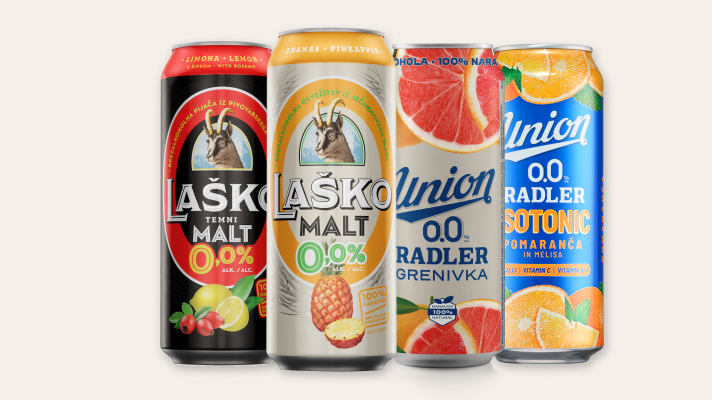 na svetlem ozadju so prikazane štiri pločevinke brezalkoholnih pijač Laško in Union, postavljene v vrsto. Od leve proti desni: Laško Temni Malt 0,0% z okusom limone in limete; Laško Malt 0,0% z okusom ananasa; Union Radler 0,0% Grenivka; in Union Radler Isotonic 0,0% Pomaranča z meliso.