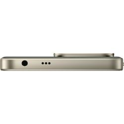 Zgornji rob pametnega telefona Redmi z 3,5 mm priključkom za slušalke ter dodatnimi odprtinami za zvočnik in mikrofon.