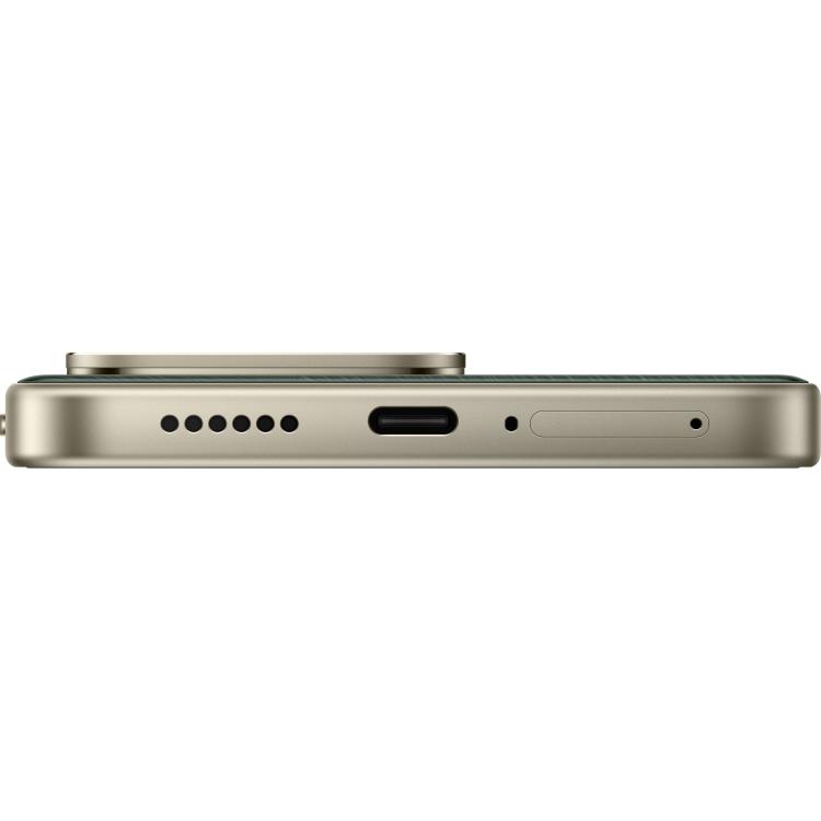 Spodnji rob pametnega telefona Redmi z zvočnikom, priključkom USB-C, mikrofonom in režo za kartico SIM.