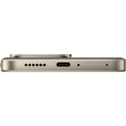 Spodnji rob pametnega telefona Redmi z zvočnikom, priključkom USB-C, mikrofonom in režo za kartico SIM.