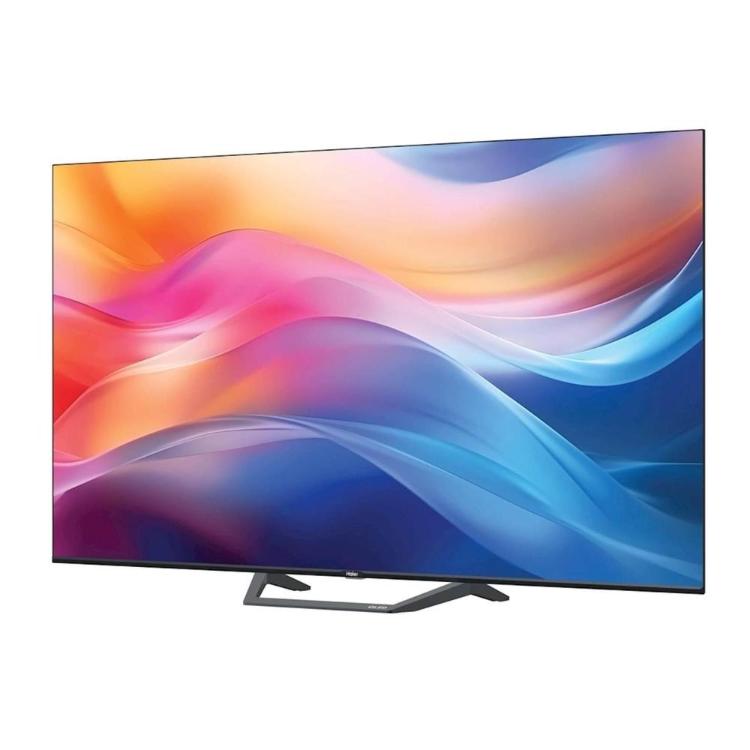 Sprednji pogled QLED TV Haier z živahnimi barvami in skoraj brezrobim 65" zaslonom.
