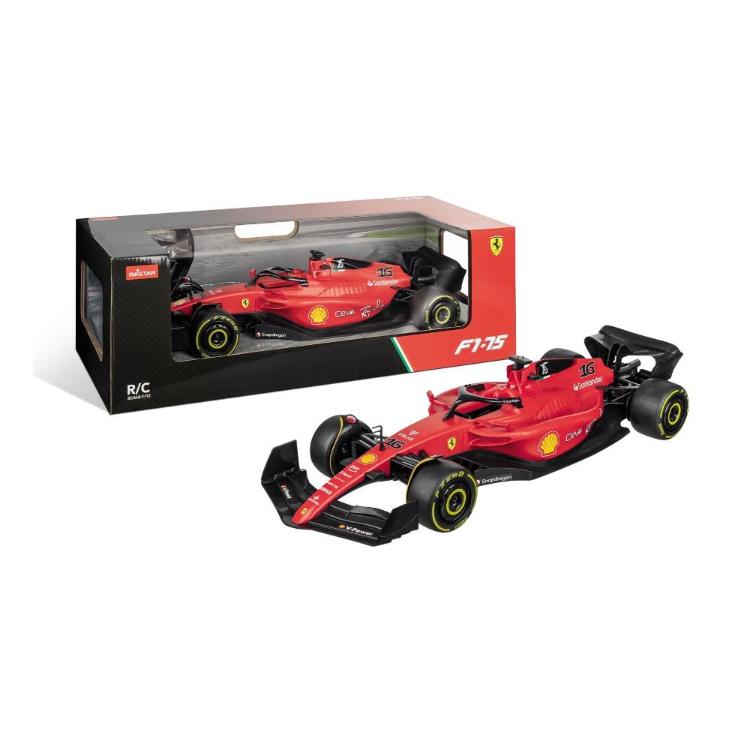 RC model dirkalnika Ferrari F1-75 v rdeči barvi, merilo 1:12, prikazan z embalažo Rastar.