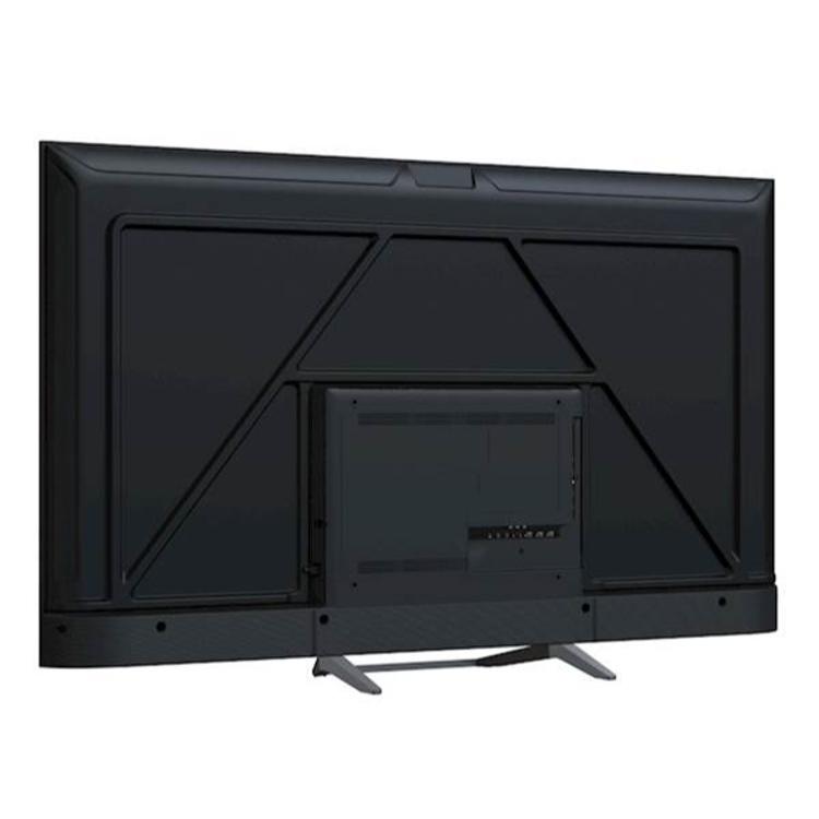 Zadnja stran TV Haier z robustnim panelom, sredinskim modulom in kovinskim stojalom.