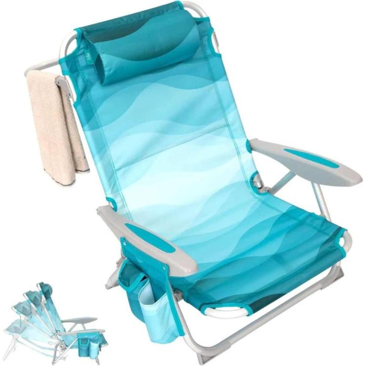 Zložljiv plažni stol s štirimi nastavljivimi položaji, nasloni za roke, blazino in stranskimi žepki.