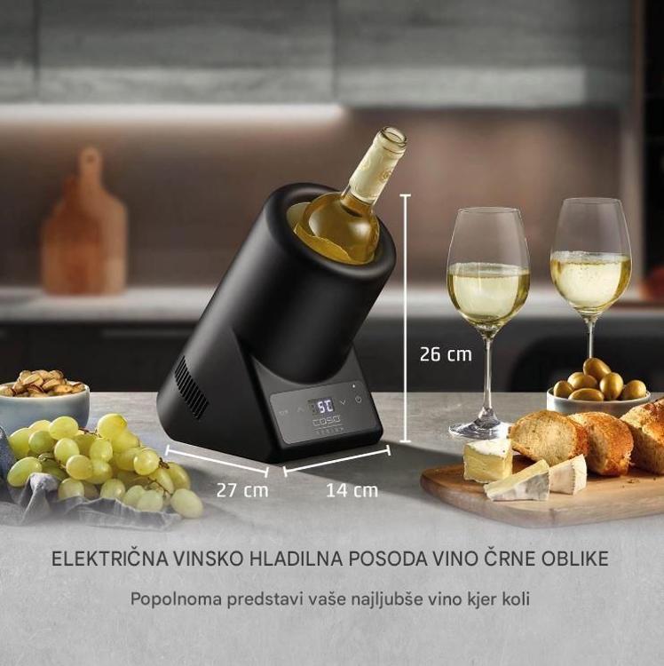 Električna hladilna posoda za vino ohranja steklenico na idealni temperaturi in jo elegantno predstavi na mizi.