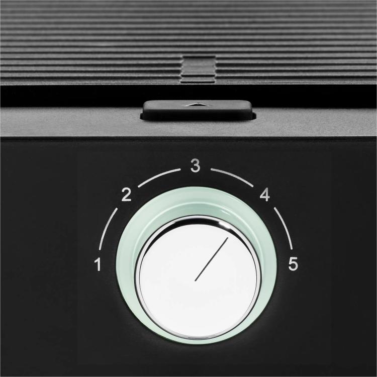 Detajl upravljanja WMF namiznega žara z gumbom za nastavitev temperature in označenimi stopnjami