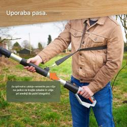 Prikaz pravilne uporabe naramnice na teleskopski verižni žagi VonHaus za boljšo porazdelitev teže med delom.