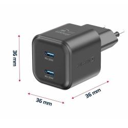 Hitri polnilnik Swissten GaN 2× USB‑C PD 20 W z elegantnim črnim ohišjem omogoča sočasno polnjenje dveh naprav ter zagotavlja varno, stabilno in hitro napajanje doma, v pisarni ali na poti.