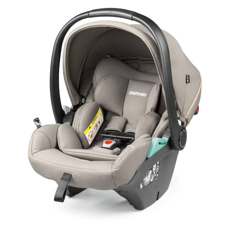 Otroški avtosedež z ročajem in strešico v bež barvi, pogled od spredaj