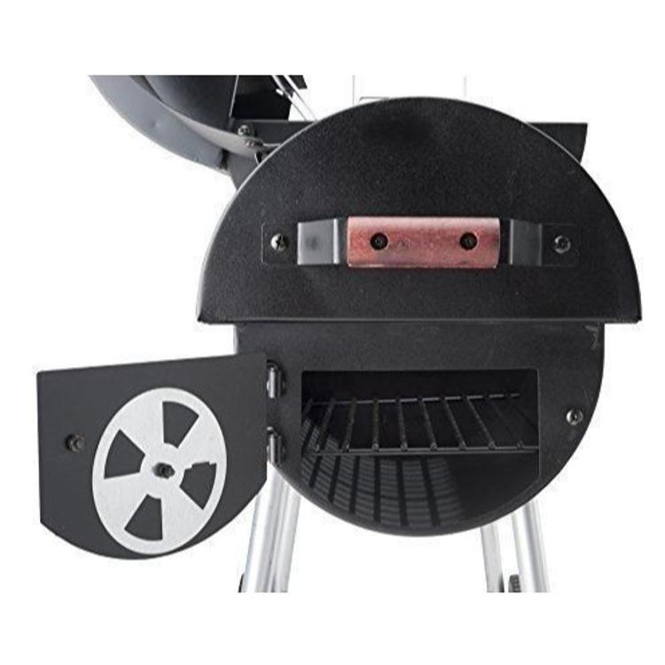 Detajl stranske dimne komore ogljenega žara Landmann z zračnim regulatorjem.