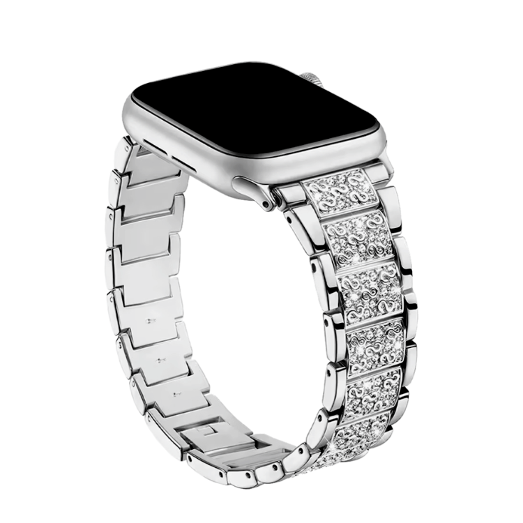 Pametna ura Apple Watch s srebrnim kovinskim paščkom z dekorativnimi kamni, eleganten in prestižen videz.