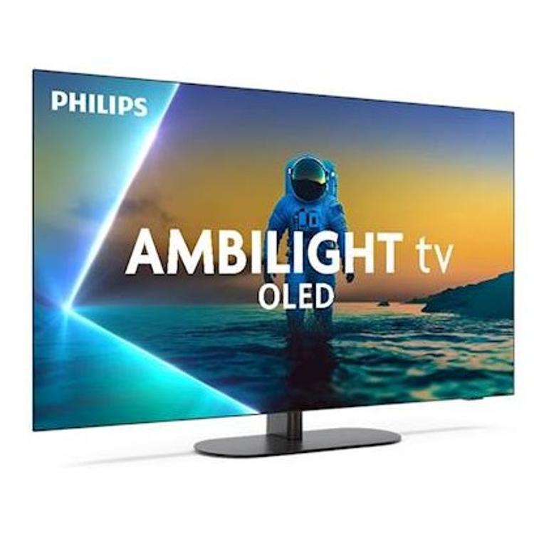 Philips Ambilight OLED TV: poševni pogled na tanek zaslon, astronaut v vodi, barvit Ambilight efekt.