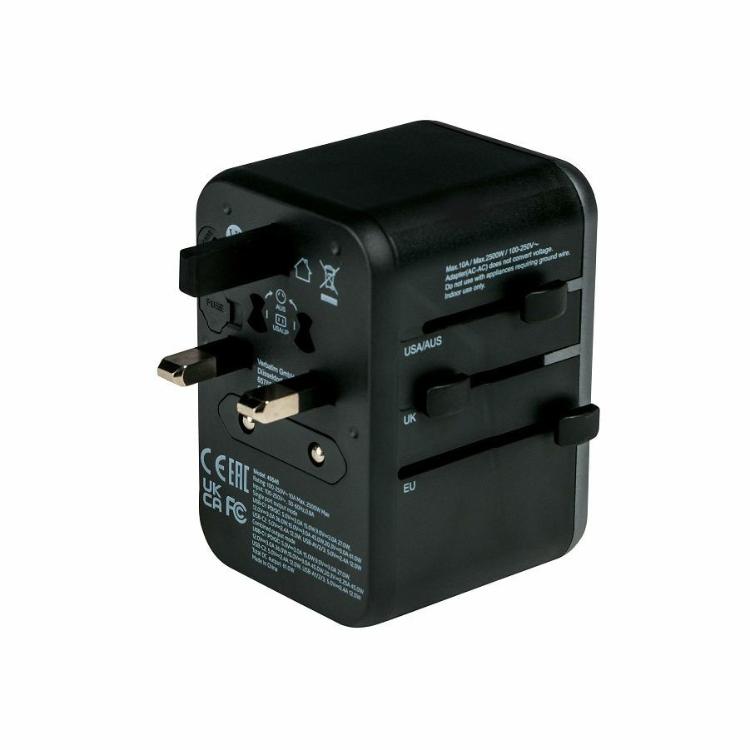 Verbatim adapter: univerzalni potovalni adapter z izvlečnimi EU/UK/USA/AUS vtikači in varnostnimi oznakami.