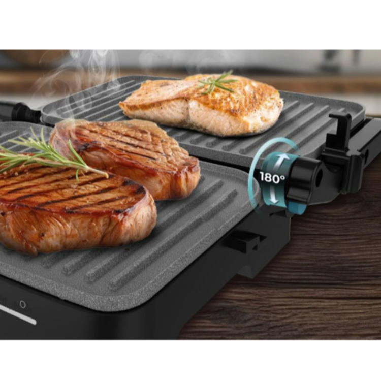 Cecotec električni namizni žar v črni barvi, prikazan z odpiranjem za 180° in grill ploščama za peko mesa in rib.