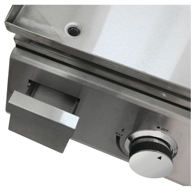 Detajlna slika iz nerjavečega jekla s pladnjem in gumbom za upravljanje žara Cattara.