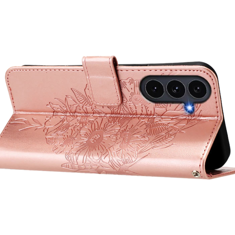Roza-zlata preklopna torbica WLGO Butterfly za Samsung Galaxy S26 FE v položaju stojala za udobno gledanje videov.