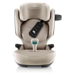 Otroški avtosedež Britax Römer v bež barvi z varnostnim pasom in oporo za glavo