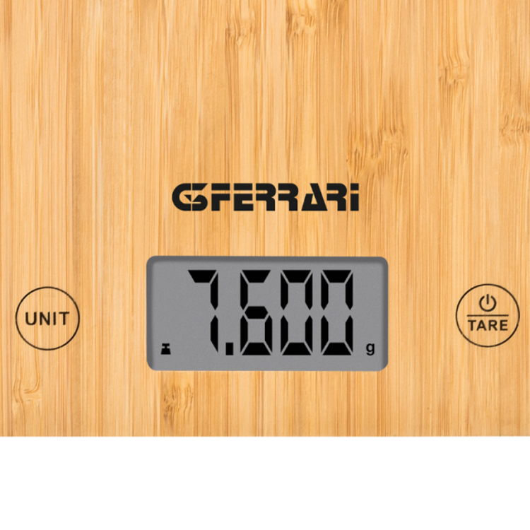 Detajl zaslona G3Ferrari tehtnice z prikazom 7.600 g ter tipkama UNIT in TARE