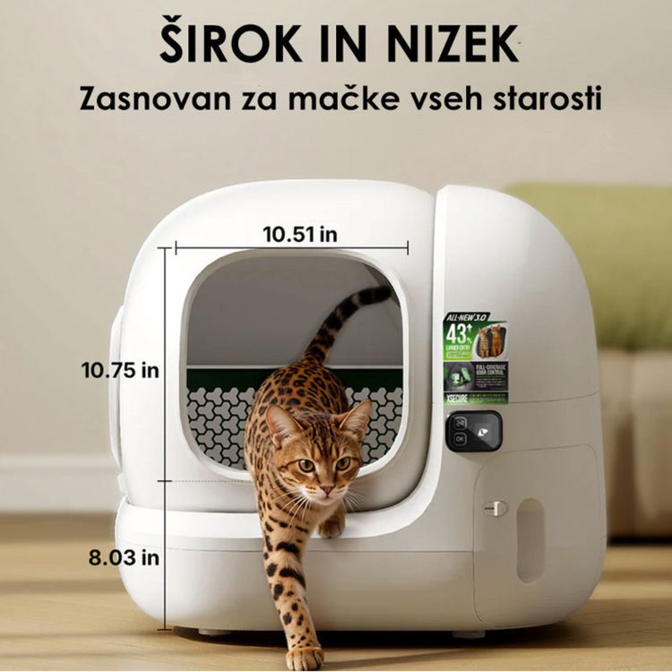 PETKIT Purobot Max Pro samodejna mačja toaleta v beli barvi, prikazana z mačko ob vhodu ter označenimi dimenzijami odprtine 26,7 × 27,3 cm.