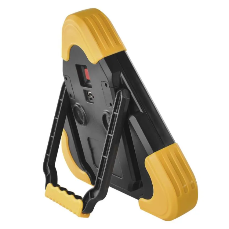 Hrbtna stran EMOS trikotnika z ročajem, stojalom in priključki za polnjenje.