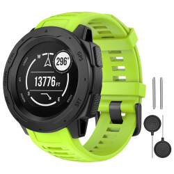 Zelen silikonski pašček za Garmin Instinct z zamenljivimi zatiči, zasnovan za športno uporabo in udobno nošenje.