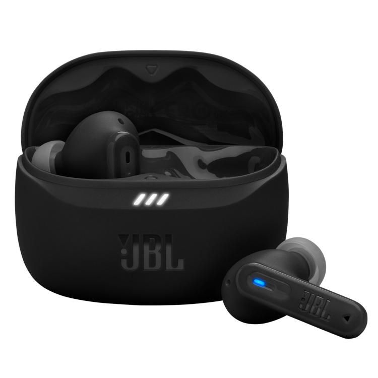 Odprta škatlica JBL z vidnimi čepki, en izven škatlice z modro LED.