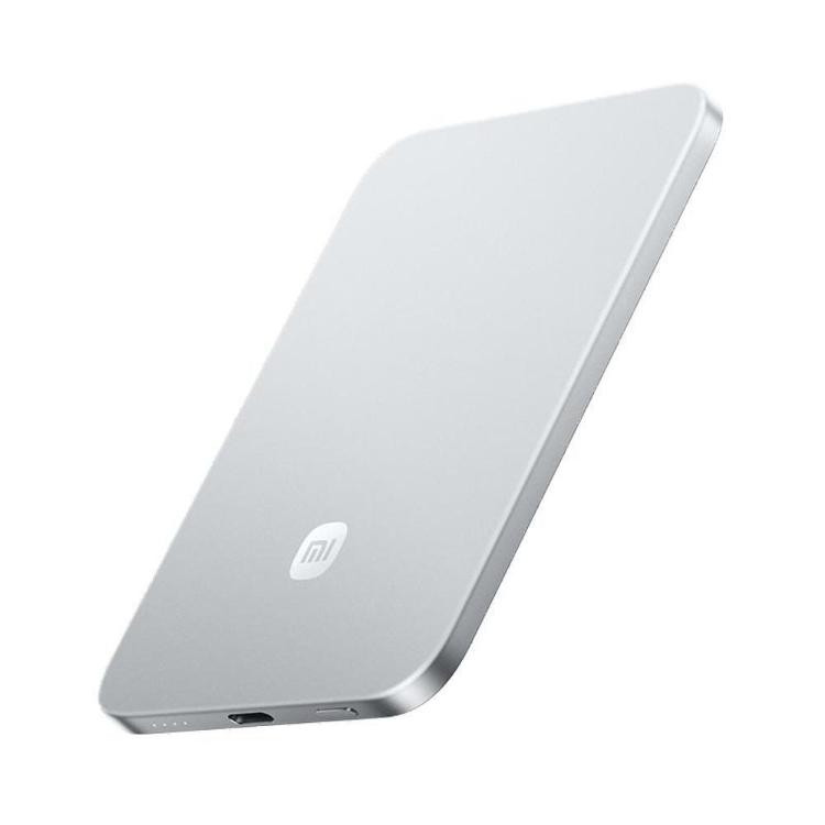 Prenosna baterija Xiaomi Ultra Thin Magnetic 15W 5000 GL, srebrna, s tankim ohišjem in magnetnim pritrjevanjem.