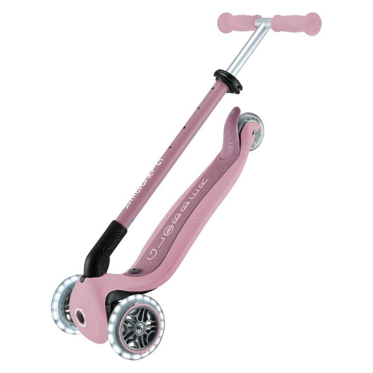 Otroški skiro z integriranim sedežem v roza barvi, stranski pogled