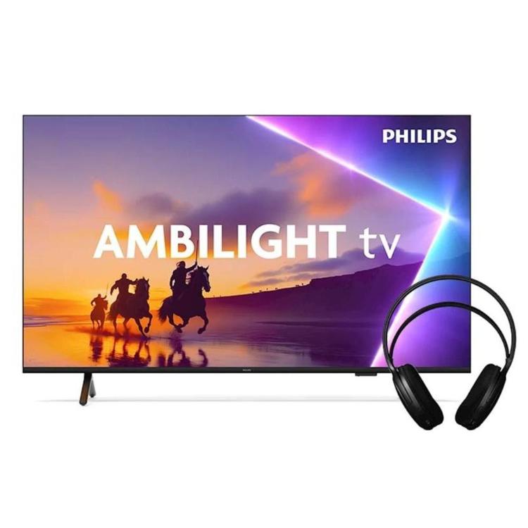 Philips Ambilight TV 85PUS8510: 4K zaslon s prizorom jahanja ob sončnem zahodu, priložene črne slušalke.