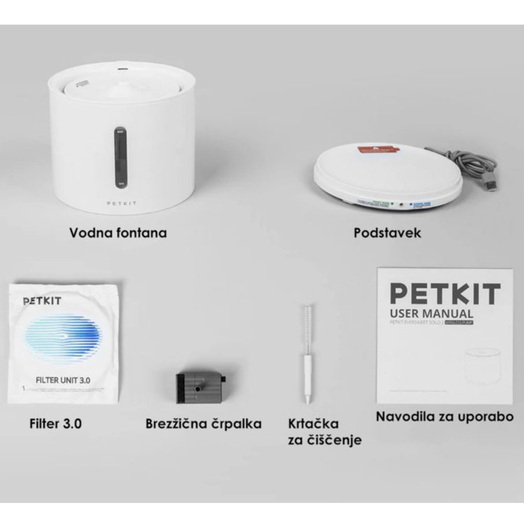 PETKIT Eversweet Solo 2 pametna vodna fontana v beli barvi, prikazana z vsebino kompleta, vključno s filtrom, brezžično črpalko, podstavkom in krtačko za čiščenje.