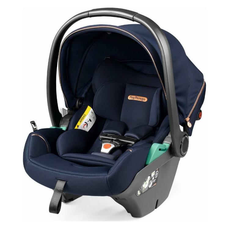 Otroški avtosedež Peg Perego v temno modri barvi, pogled spredaj z ročajem in oblazinjenjem