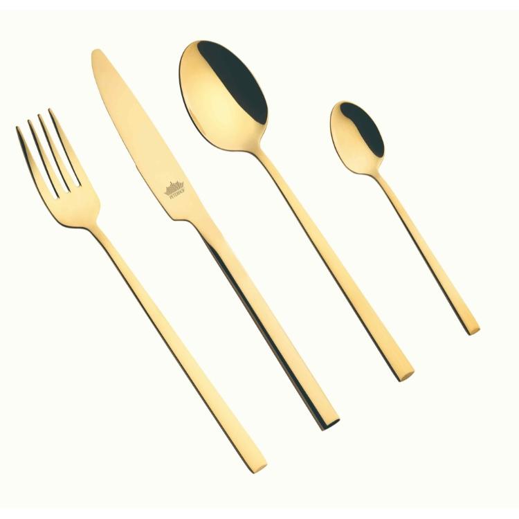 Zlato obarvan jedilni pribor SARA iz nerjavečega jekla, vilice, nož in žlice na svetlem ozadju.