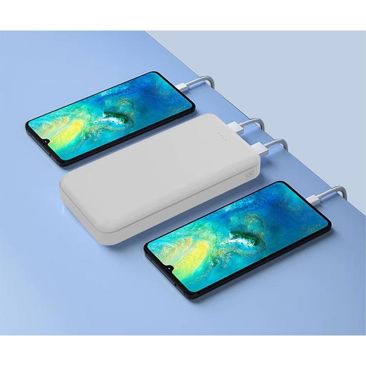 Prenosna baterija, ki hkrati polni tri telefone prek kablov.