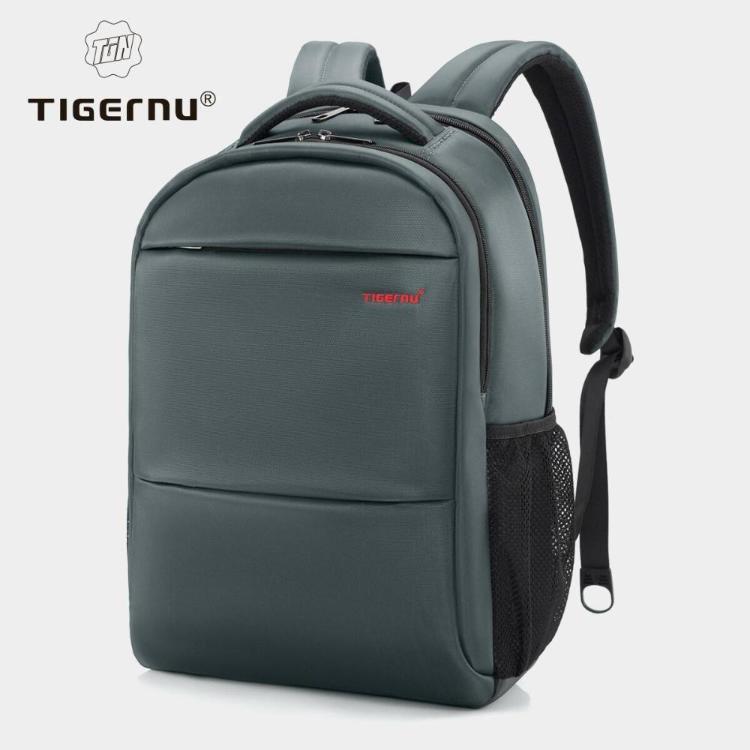 Siv nahrbtnik Tigernu NORMA za prenosnike do velikosti 15,6" (diagonala) z minimalističnim dizajnom, več predelki na zadrgo in oblazinjenimi naramnicami nudi praktično in varno shranjevanje za vsakodnevno uporabo.
