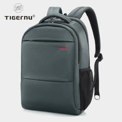 Siv nahrbtnik Tigernu NORMA za prenosnike do velikosti 15,6" (diagonala) z minimalističnim dizajnom, več predelki na zadrgo in oblazinjenimi naramnicami nudi praktično in varno shranjevanje za vsakodnevno uporabo.